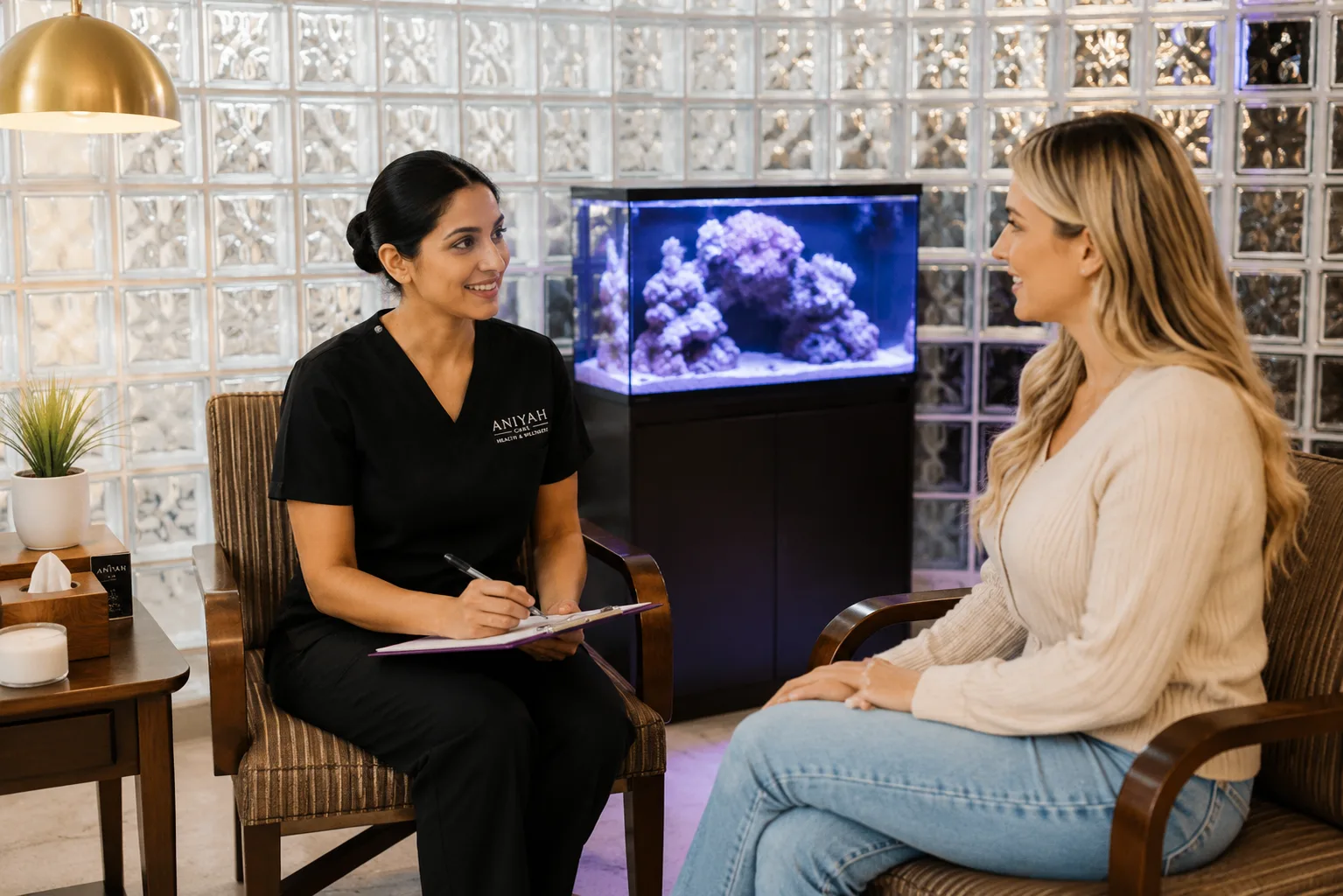 Patient discussing fertility acupuncture treatment options at Aniyah Care Health & Wellness in Ajax, Ontario.